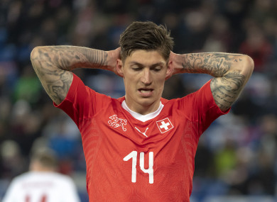 Switzerland's Steven Zuber reacts during the match.
