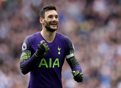 Hugo Lloris celebrates saving a Pierre-Emerick Aubameyang.