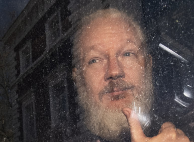 Assange arriving at court on Thursday