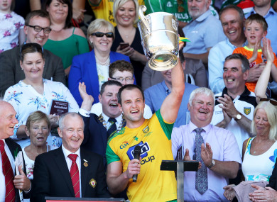 Michael Murphy lifts the trophy.