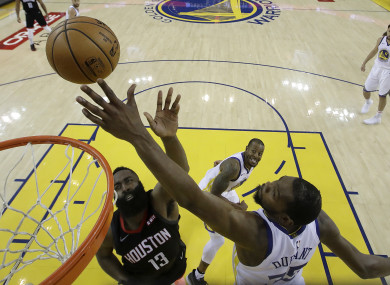 Kevin Durant blocks a shot from James Harden.