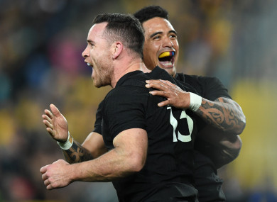 Ryan Crotty (L) celebrates his try with team-mate Aaron Smith during an August 2017 Bledisloe Cup game.