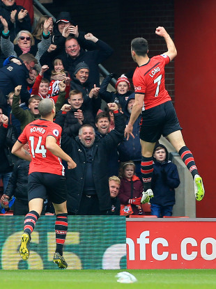 Shane Long celebrates after scoring Southampton's third goal against Wolves.