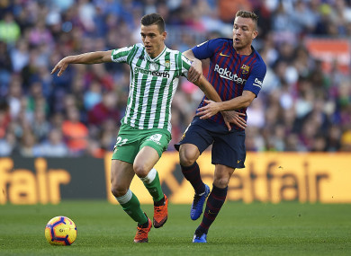 Lo Celso under pressure from Barcelona midfielder Arthur.