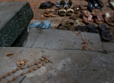 Footwear and personal belongs of victims kept close to the scene of a suicide bombing at St. Sebastian Church in Negombo, Sri Lanka.