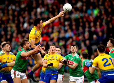 Tadgh O'Rourke of Roscommon rises above Aidan O'Shea.
