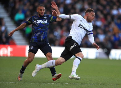 Goalscorer Kemar Roofe (left) alongside Ireland defender Richard Keogh.