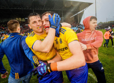 Roscommon players Diarmuid Murtagh and Enda Smith celebrate their win.