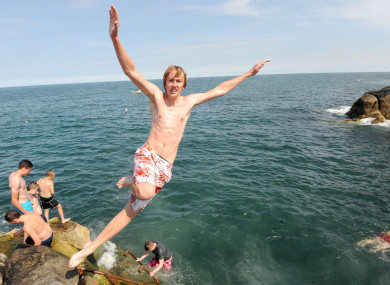 File photo of someone jumping in at the Forty Foot at Sandycove, Dublin.