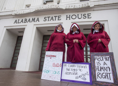 Handmaid's Tale protest against abortion ban bill at the Alabama Statehouse.