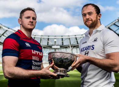 Michael Noone and Brian Hayes with hands on the cup.