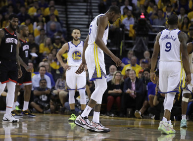 Kevin Durant limps off the court during Game 5 against the Houston Rockets.