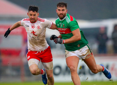 Mayo's Aidan O’Shea with Matthew Donnelly of Tyrone.