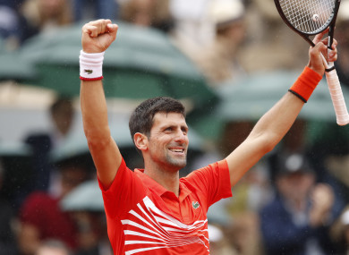 Novak Djokovic celebrates after his fourth-round victory.