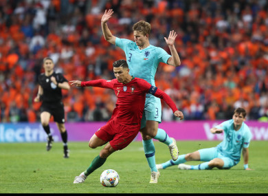 The pair in action at at the Estádio do Dragao last night.