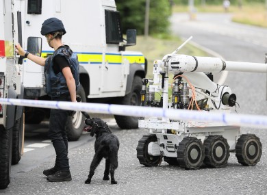 Ammunition technical officers near the scene in Tullygally Road, Craigavon, Co Armagh.