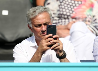 Jose on his phone.