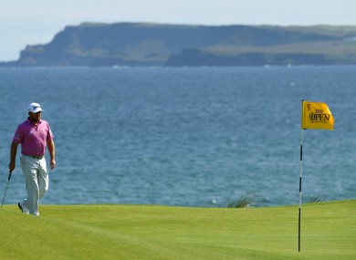 Local hero: Graeme McDowell playing at Portrush earlier.
