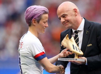 Megan Rapinoe and Gianni Infantino.
