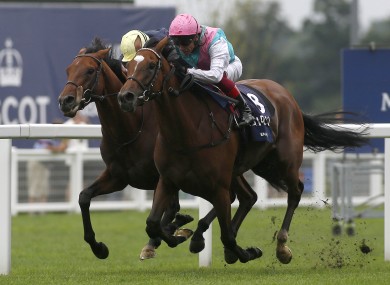 Enable and Frankie Dettori (right) get the better of Crystal Ocean and James Doyle to win The King George VI.
