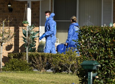 Police officers have established a crime scene at the house in St Clair, Sydney.
