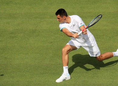 Tomic in action at Wimbledon on Tuesday.