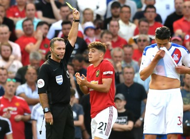 Daniel James is booked for simulation against Crystal Palace.