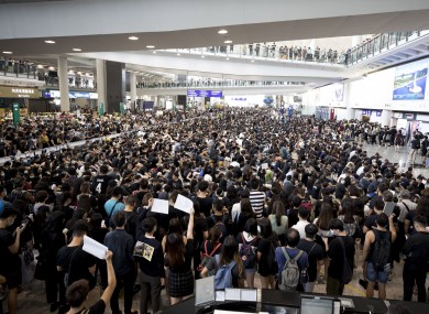 Crowds descend on Hong Kong International Airport.