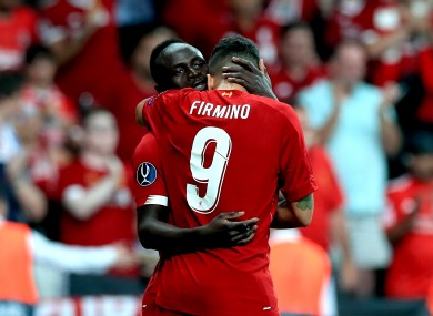 Sadio Mane and Roberto Firmino celebrate.