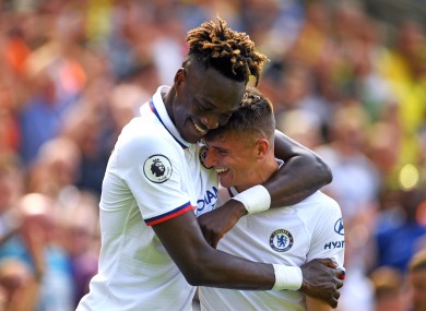 Abraham celebrates with Mason Mount at Carrow Road.