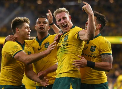 Reece Hodge celebrates his try for the Wallabies.