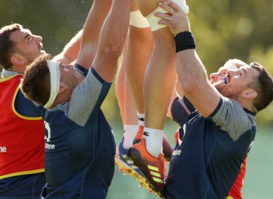 CJ Stander and Cian Healy lifting a line-out in training.