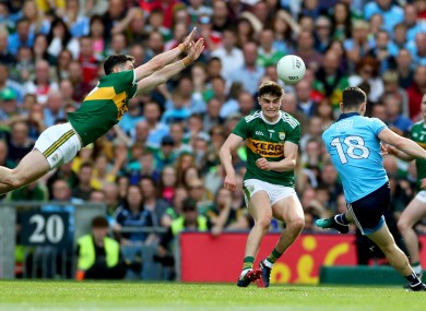 Paul Geaney attempting a block on Dublin's Diarmuid Connolly.