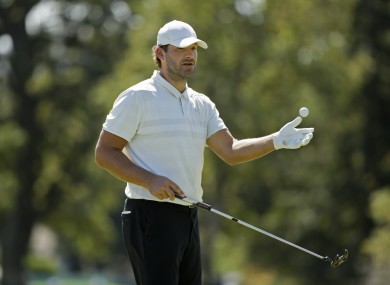 Tony Romo prepares to putt on the third green of the Silverado Resort North Course.