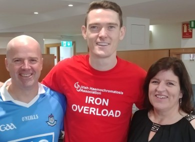 Karl Mackey and his sister Amanda with Gaelic footballer Brian Fenton