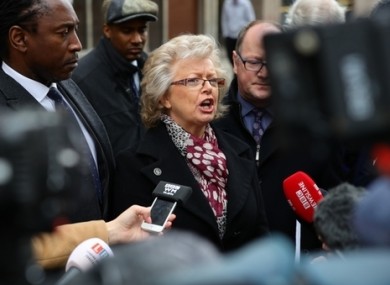 Julie Hambleton (centre) speaks to the media outside the Civil Justice Centre in Birmingham after the conclusion of the Birmingham Inquests into the pub bombings.
