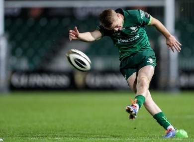 Fitzgerald keeps his head down to drive a kick at goal during the win over Dragons.