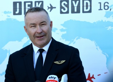 Qantas Captain Sean Golding speaks to the media during a press conference at Sydney International Airport.