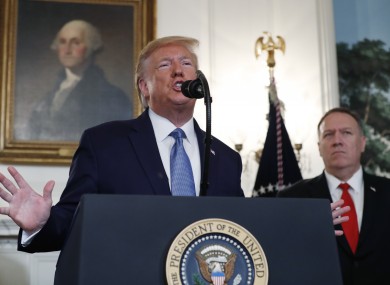President Donald Trump, accompanied by Secretary of State Mike Pompeo