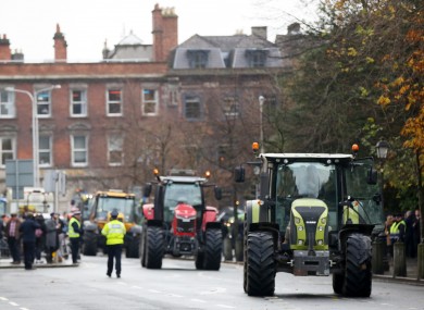Farmers arrive along St Stephen's Green.