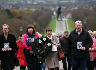 Oliver McVeigh (right) and his sister Dympna Kerr (second left), brother and sister of Columba McVeigh, along with Marie Lynskey, niece of Joe Lynskey, and Mike Pywell, carrying a photograph of Robert Nairac, the three men who's remains are yet to be recovered,