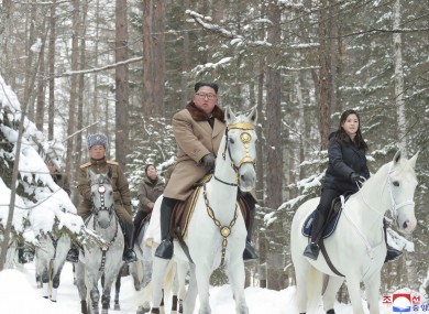 Kim Jong Un,with his wife Ri Sol Ju riding on white horses during a visit to Mount Paektu, North Korea.
