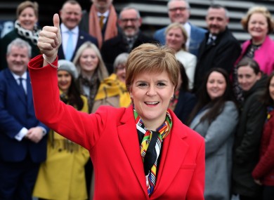 Nicola Sturgeon celebrates with her MPs after last week's election victory.