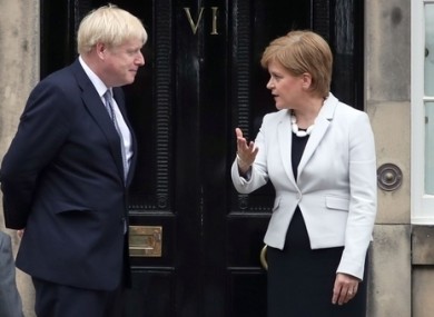 Sturgeon welcomes Johnson to Bute House in Edinburgh.