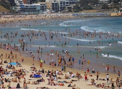 Crowds of people are seen at Bondi Beach on Christmas Day in Sydney.