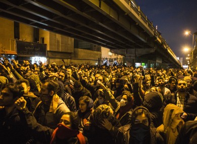 People attend a mourning ceremony for the victims of the Ukrainian plane crash in Tehran.