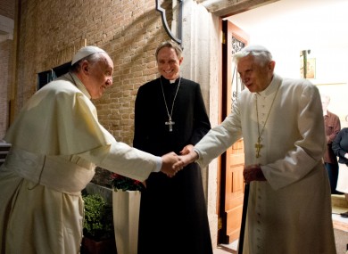 File photo. Pope Francis greeting Pope Benedict.