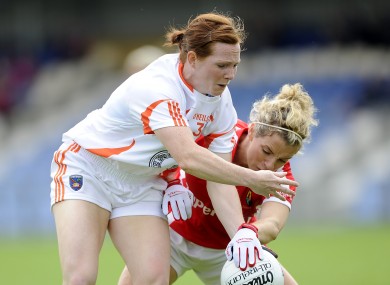Caoimhe Morgan in action against former Cork star Valerie Mulcahy.