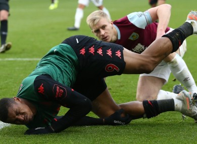 Ben Mee brings down Wesley.
