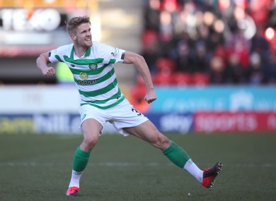 Celtic's Kristoffer Ajer celebrates scoring.